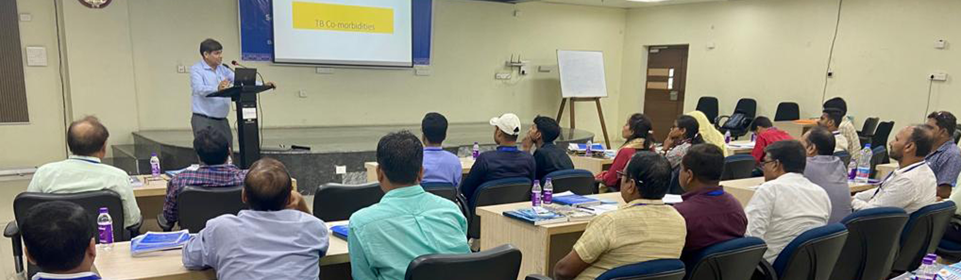 Image of scientist conducting a seminar Image of scientist conducting a seminar